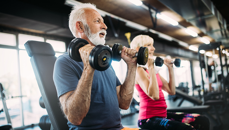 Couple exercising together to relieve neuropathic symptoms