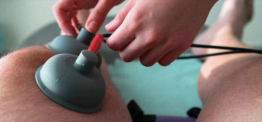 Patient receiving Electric Cell Signaling Treatment as part of the neuropathy treatment protocol at SWFL Neuropathy in Fort Myers