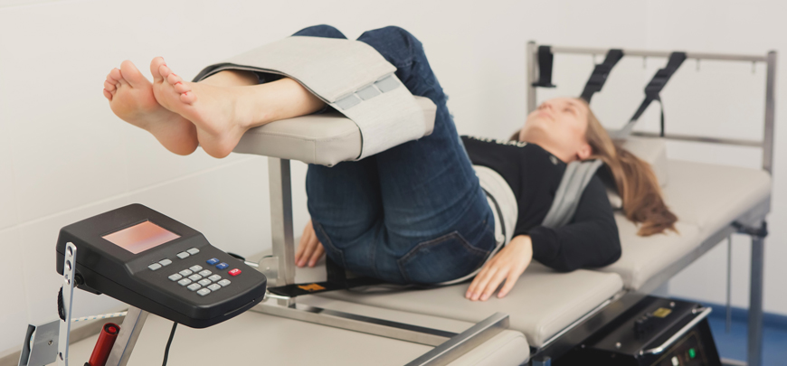 Patient receiving Vertebral Axial Decompression Therapy as part of the neuropathy treatment protocol at SWFL Neuropathy in Fort Myers